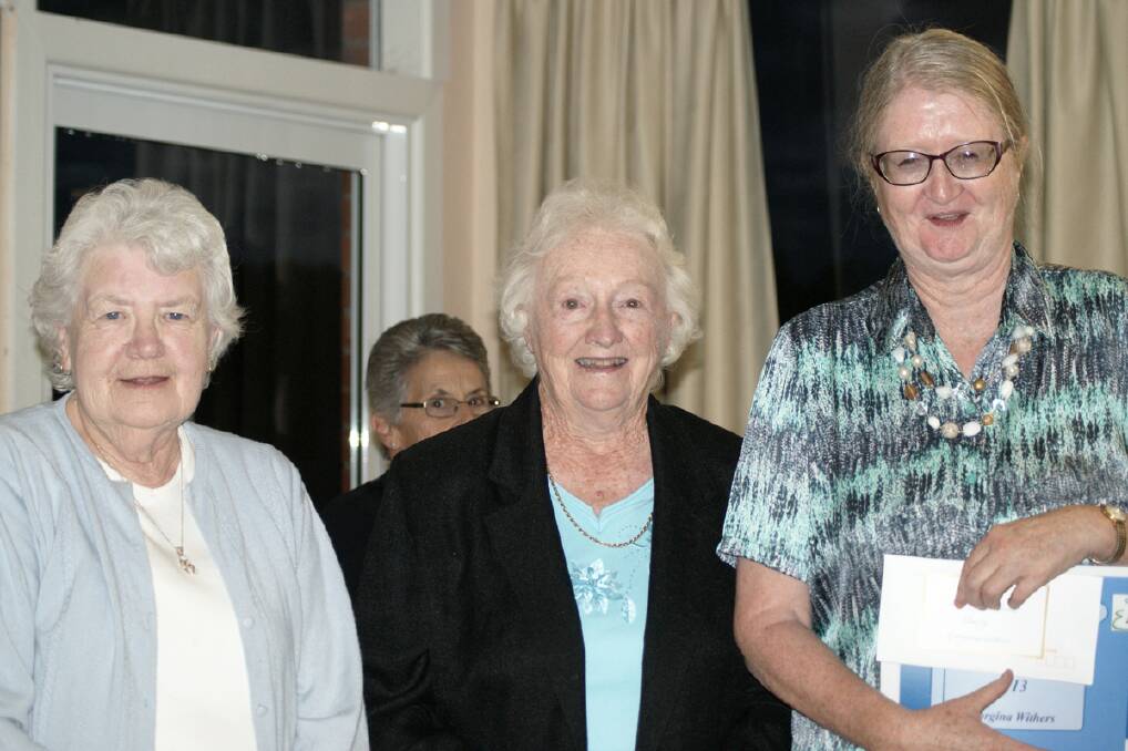 Jean Muir and Betty Crawford congratulated Georgina Withers on being the Ladies Club Champion. 