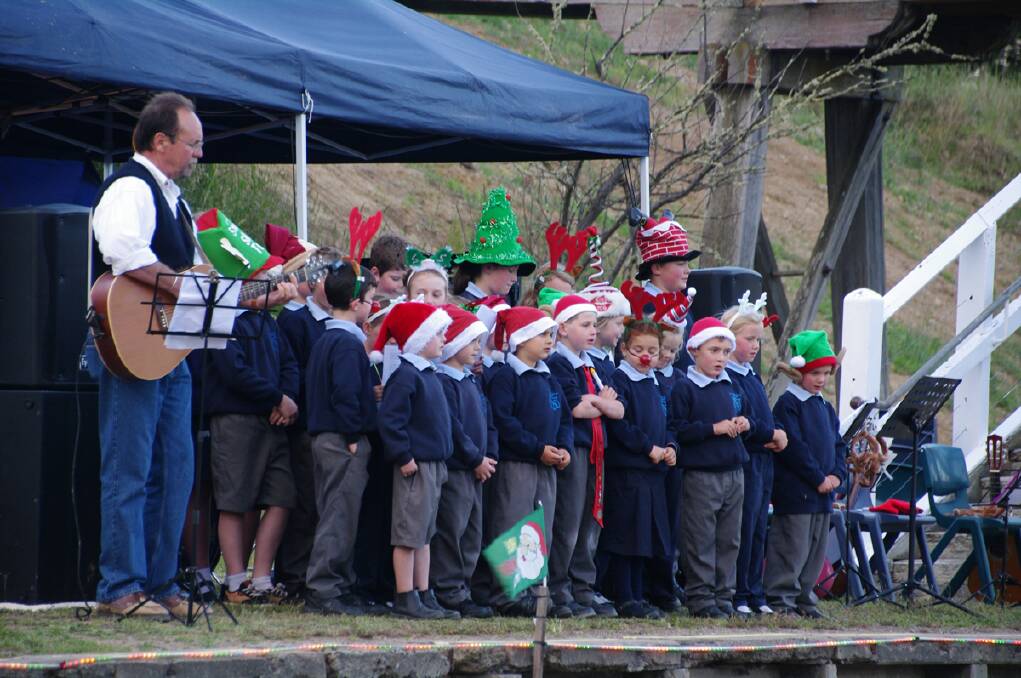Paul Bennett led the St Joseph’s Primary School Choir in “Rudolph”. 