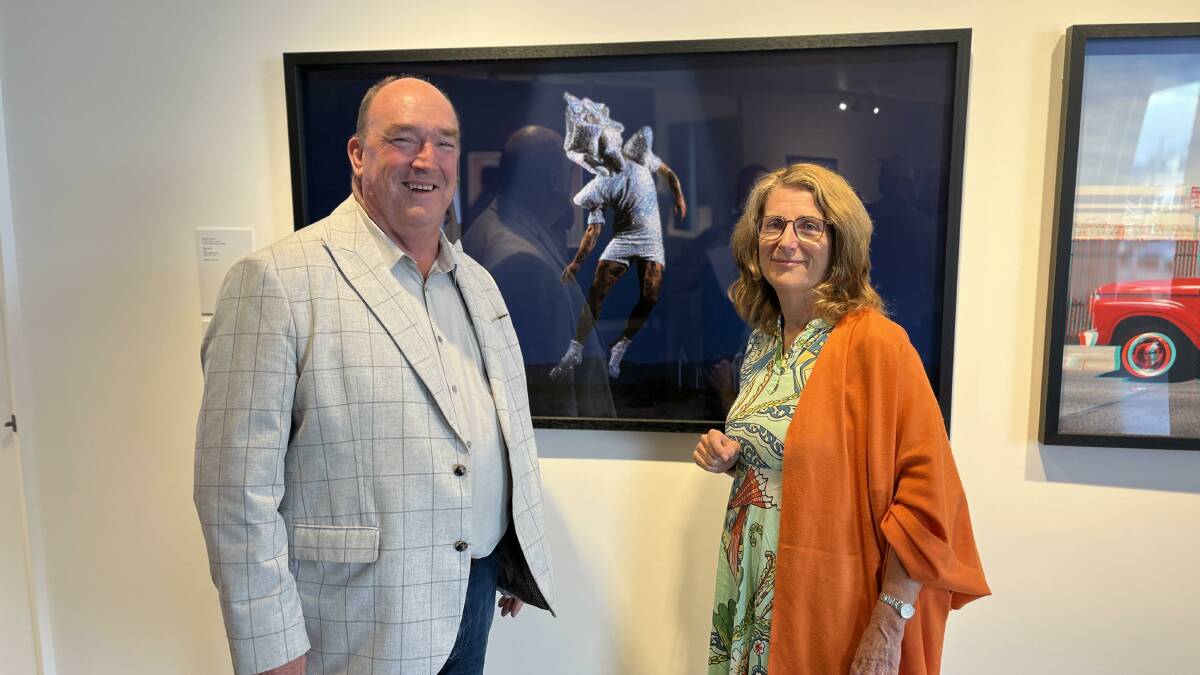 Mayor Russell Fitzpatrick in front of his favourite work of Gerwyn Davies, alongside Cr Helen O'Neil. Picture by James Parker