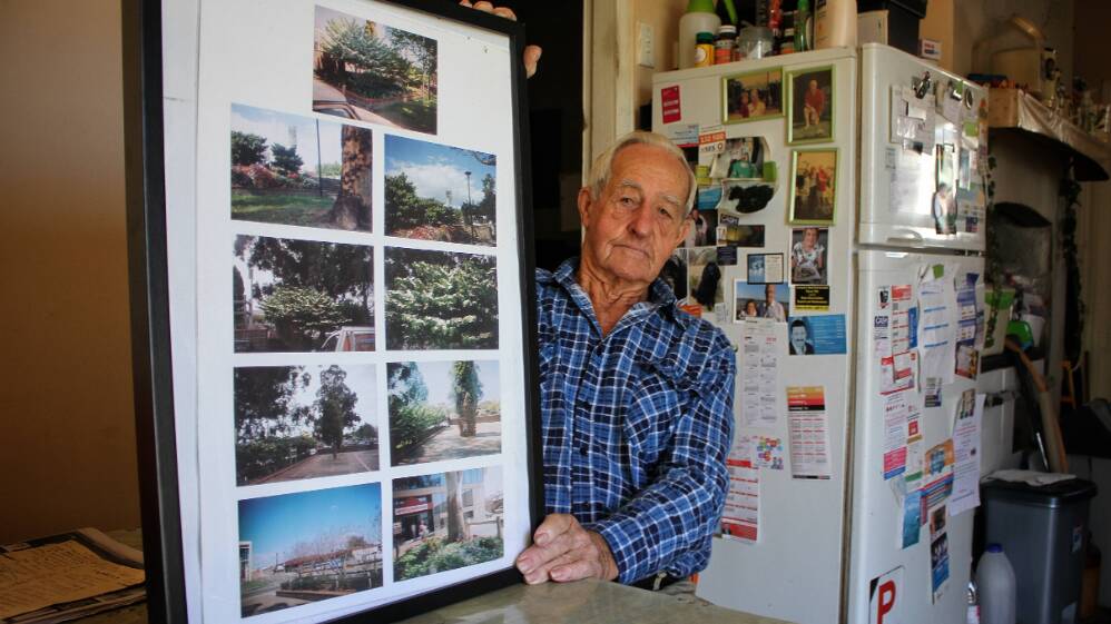 Bega's Marshall Campbell with pictures of Littleton Gardens, which he and his late wife Hazel maintained as part of a volunteer group. File picture