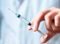 People are getting vaccinated against the flu. Shutterstock