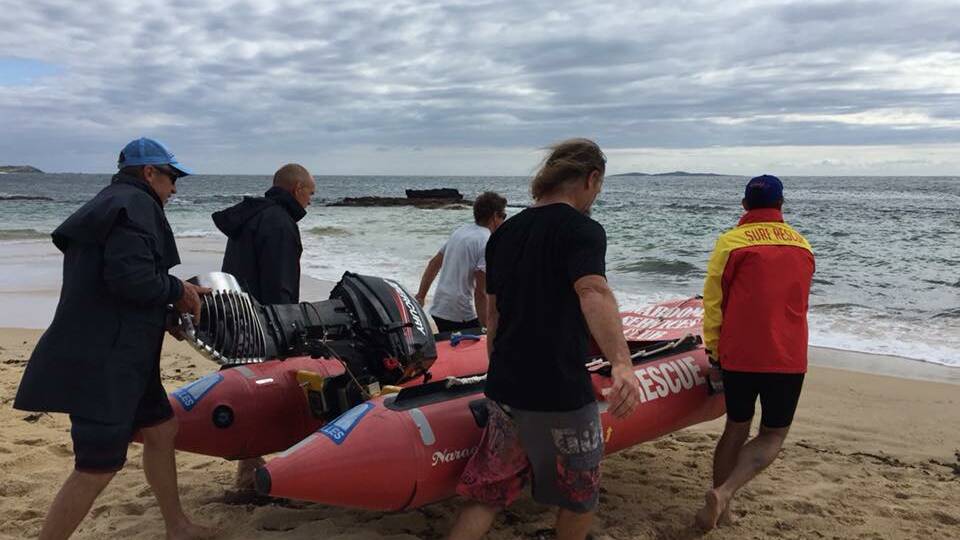 Wanda boys launch at Mystery Bay in a borrowed Narooma duck after their support boat breaks down in the George Bass surfboat marathon on January 3.