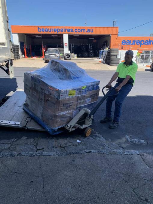 Bobbin's Transport delivers the first pallet of refrigerated goods. Picture supplied
