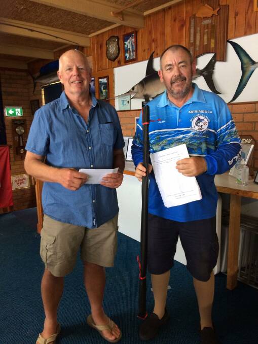 CATCH OF THE DAY: David Hay receives his first prize for bream from MBGLAC vice-president Alan Wilkins.