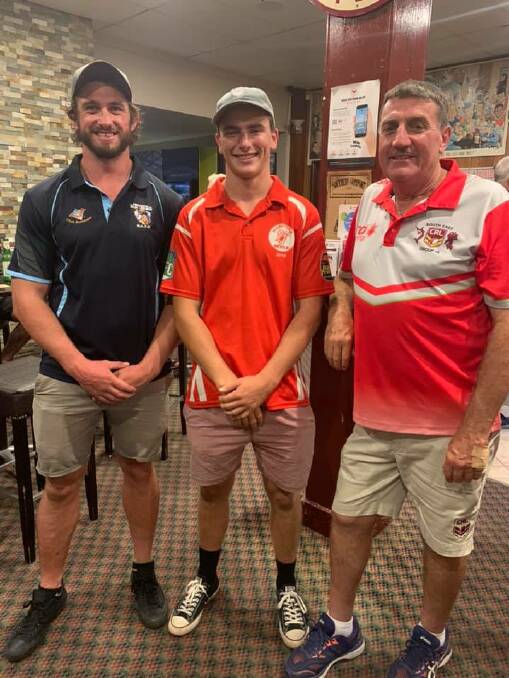 Ryan Norris of Narooma is congratulated as man of the match for the All Stars v Indigenous All Stars game by Joe Bobbin (coach) and Group 16 chairman Allan Wilton.