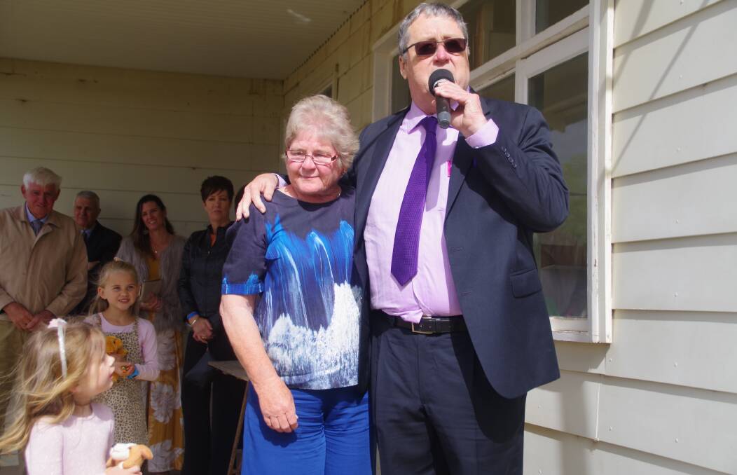 STALWART: Retiring Bombala and District Jockey Club secretary Anne Tier is presented with life membership of the club by Colin Pate.