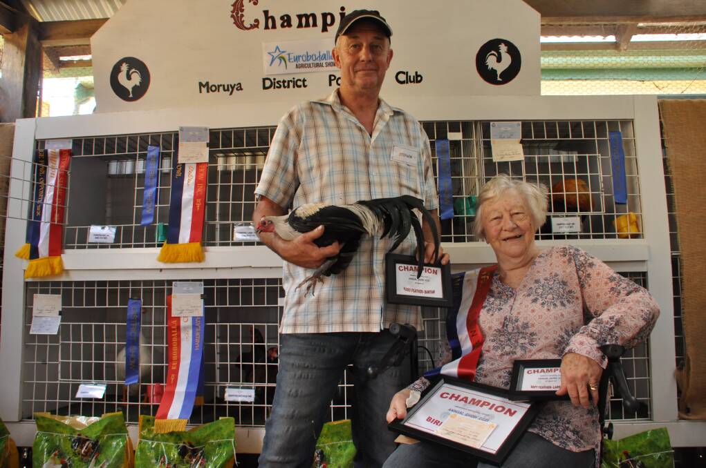 Stephen and Fay Murphy of Moruya with their old english game bantam chicken that took home the Bird of Show prize. 