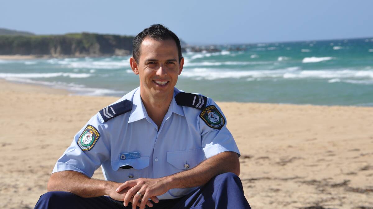 Senior constable Josh Lavender of Narooma Police happy to have been able to help at Narooma's North Bar Beach on Tuesday, February 9. 