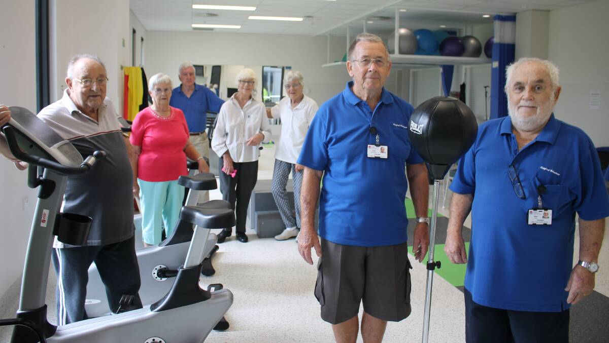 SMOOTH MOVES: Hospital volunteers Keith Williamson and Allan Hull wind down with participants after their weekly maintenance class at South East Regional Hospital. Photo: Alana Beitz 