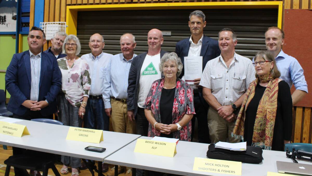 WANTING CHANGE: The candidates for Monaro stand with members of the Save Bombala Inc committee at the meeting held at Bombala High School. 