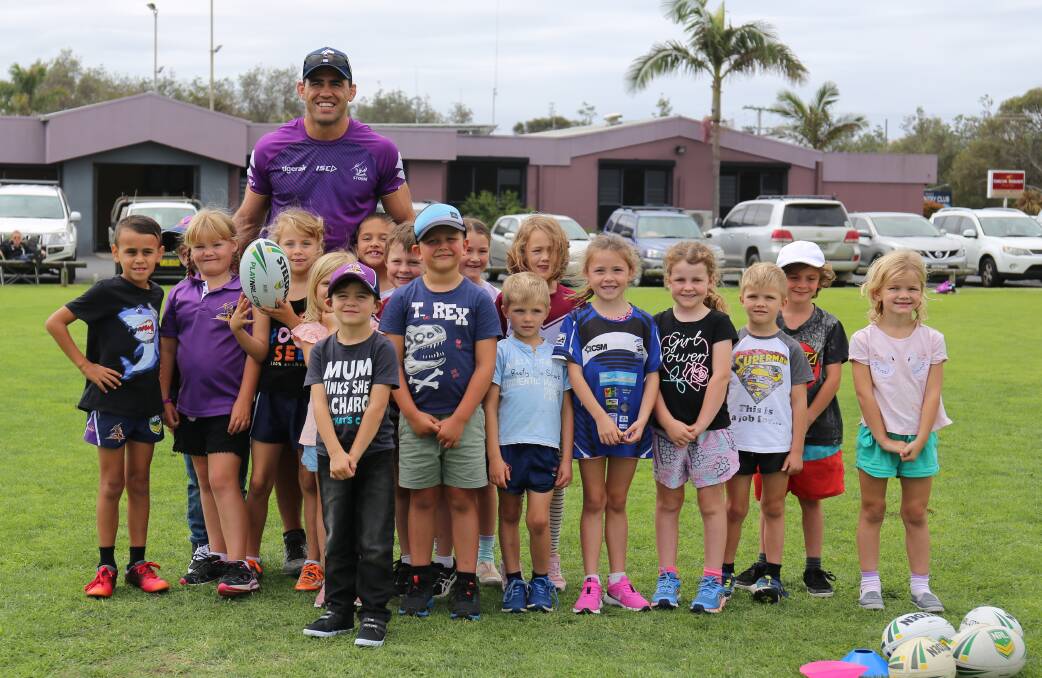 Dale Finucane catches up with some of the youngest entrants at a special skills clinic in Tathra on Saturday. 