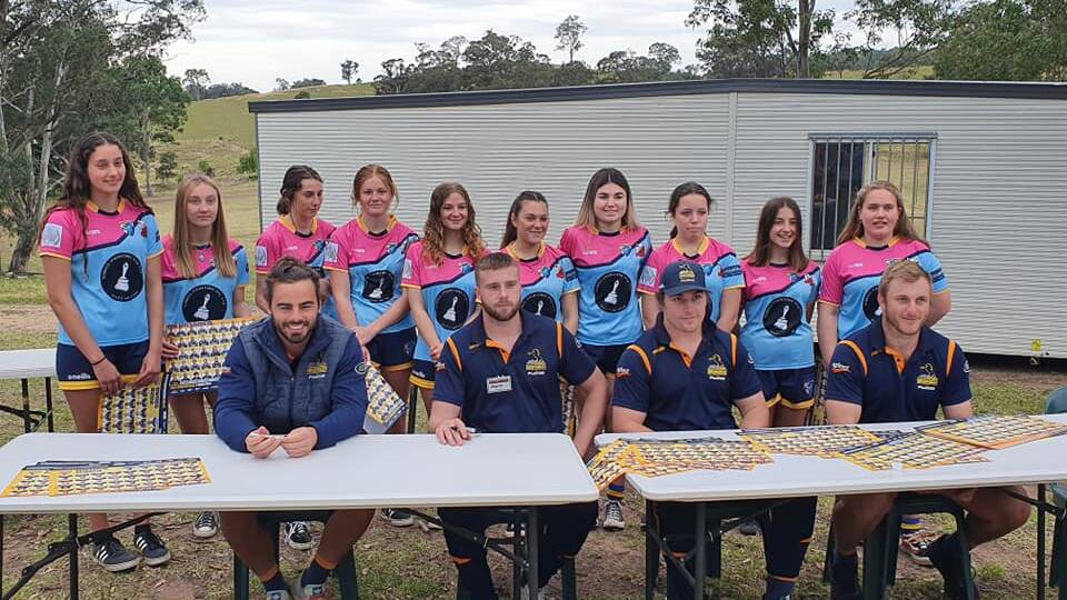 Soaring: Far South Coast Falcons girls rugby players catch up with some of the premiership winners from the ACT Brumbies at Bemboka. Picture: Falcons/Facebook.