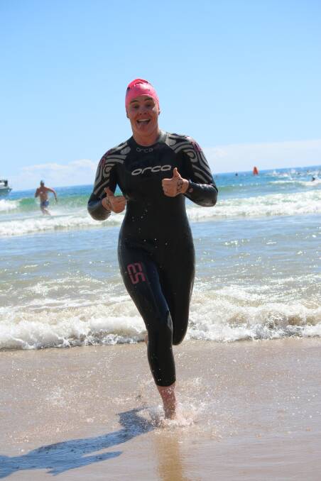 All smiles: Swim coach and past Wharf to Waves winner Zoe Philipzen said the iconic ocean swim is "very doable" and encourages people to join in. 