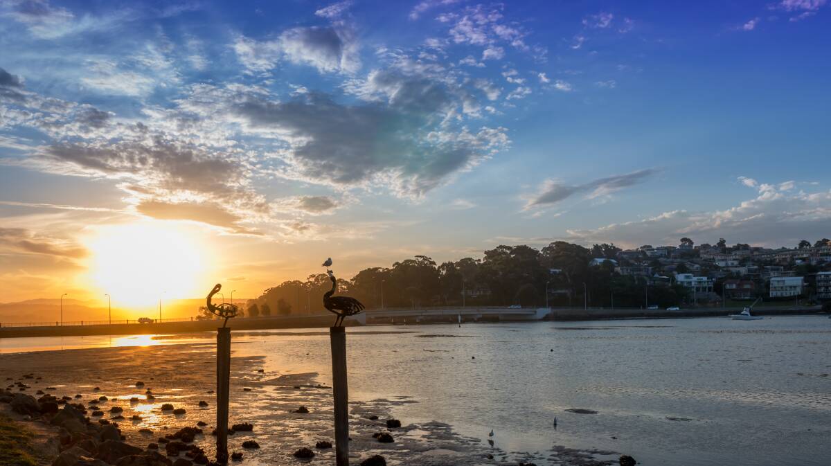 A sunset falls over Merimbula with the coast's tourism operators still open to holiday makers. 
