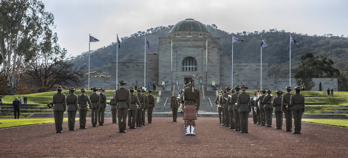 The Royal Military College Duntroon Band performs on the Memorial's Parade Ground as visitors arrive.