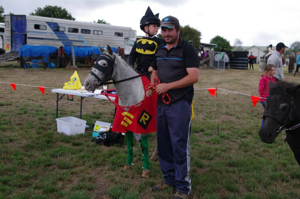 BATMAN AND ROBIN: Aspen and Jordan Cameron dressed up as Batman and Robin in the fancy dress equine section of the Delegate Show on Saturday.