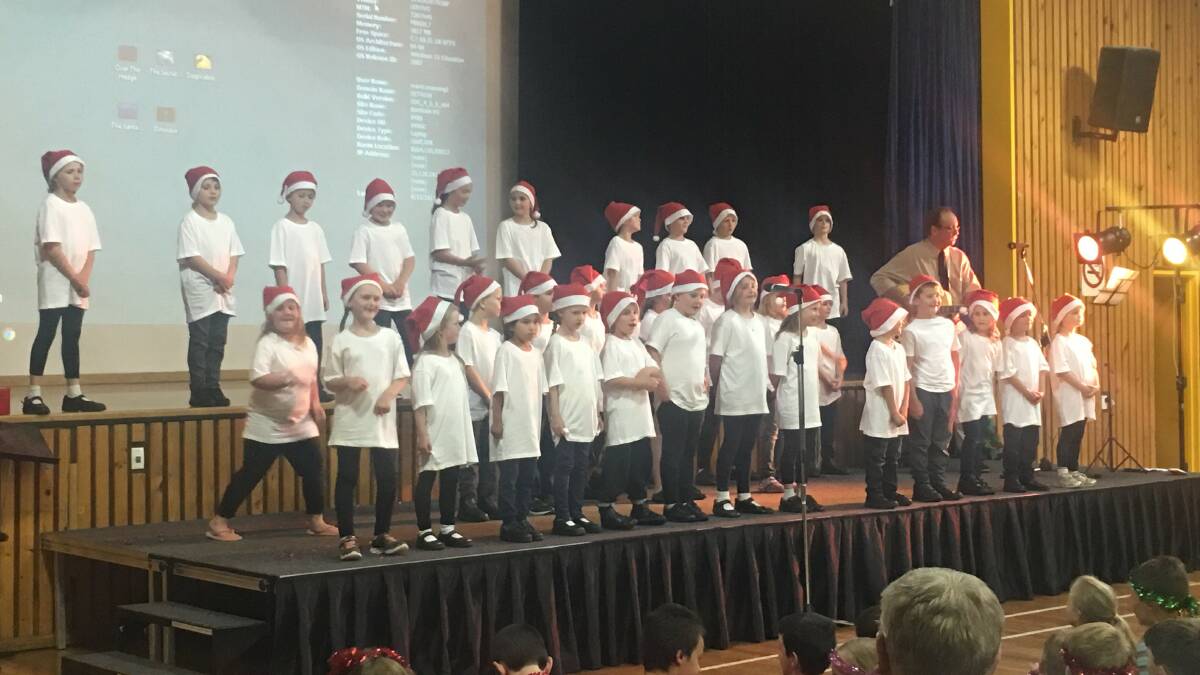 CHRISTMAS CAROLS: St Joseph's Primary Infants School showcase their dancing and singing skills for year 6 primary graduates.