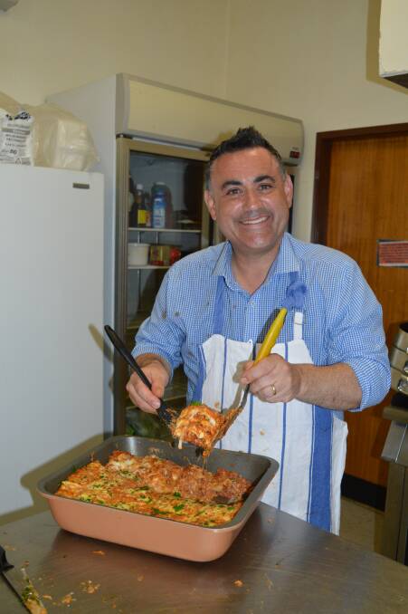 John Barilaro cooks lasagna in the Delegate Country Club kitchen.