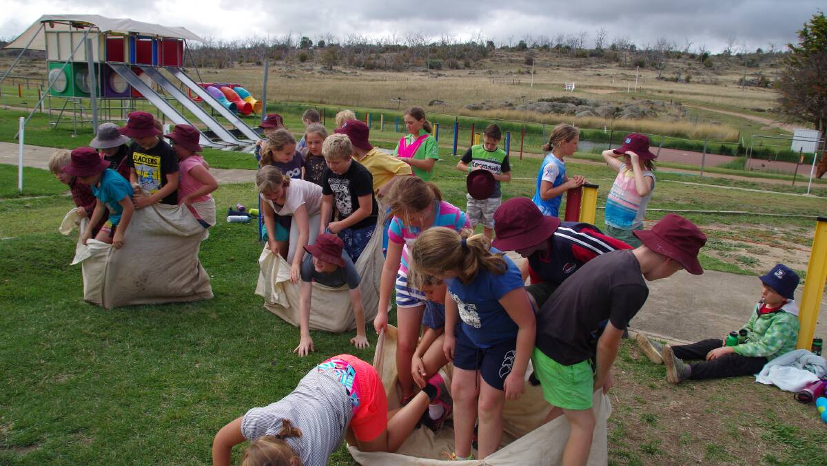 IN THE BAG: Bombala and Delegate Public School student take part in the sack races during their excursion to Cooba.