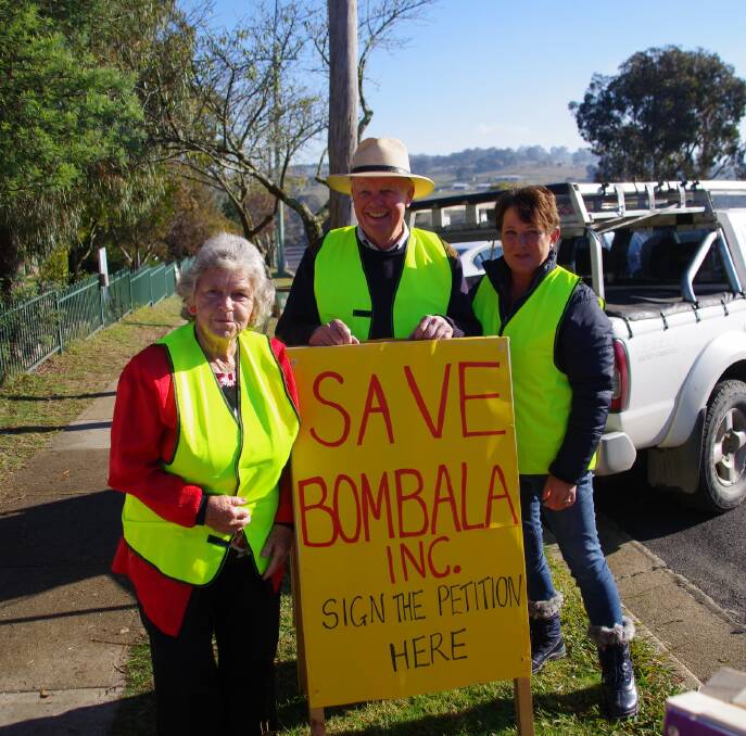 SAVE BOMBALA: Maureen Peisley, Stuart Lee and Julie Jones collecting petition signatures at the Bombala Polling Booth on Election Day.