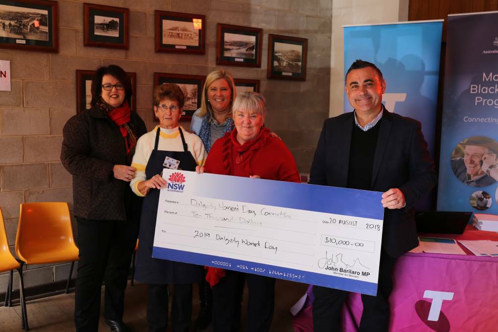  Parliamentary Secretary for Southern NSW Bronnie Taylor and Member for Monaro John Barilaro present the Dalgety Women's Day committee with a grant to help them celebrate their 20th anniversary.