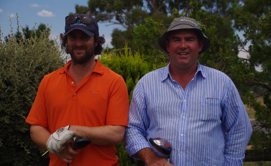 HOT CHOOKS: Bombala lads Simon Stevens and Brad Yelds took to the fairways on the weekend trying to win a chook at the Bombala Golf Club.