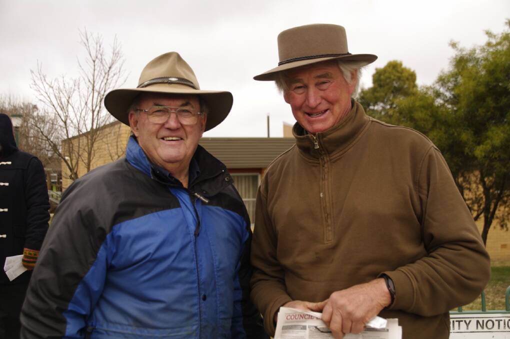 Peter Cochrane and Ned Kater did a good job handing out how to vote for Lynley Miners at Saturday's Council election in Bombala.