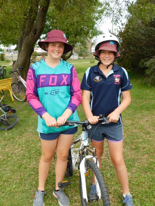 Bombala Public School students Courtney Harty and Bridie Hampshire learning about road and bike safety at school last week.