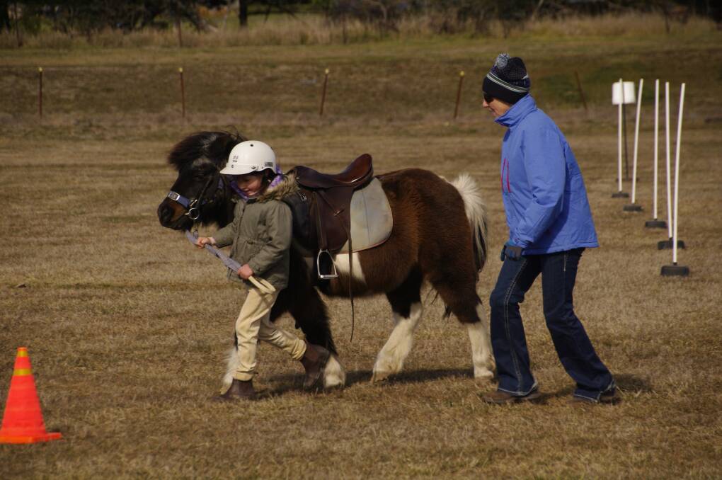 PONY CLUB: Billie Farran and her Shetland pony being taken through a leading exercise by instructor Julie Peadon of Bibbenluke.