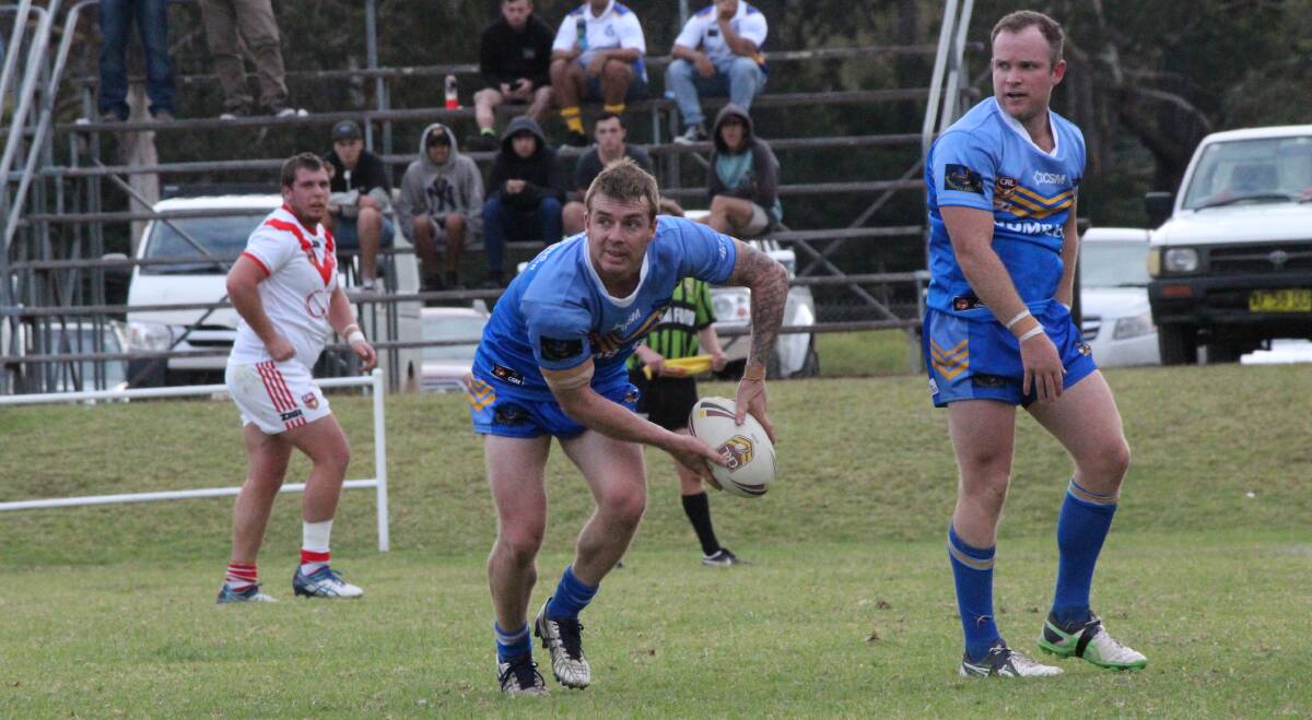 RUGBY LEAGUE: Blake Robinson passes the ball during Sunday's exciting game against Eden at Eden where the Heelers won 34 to 16 after a slow start.