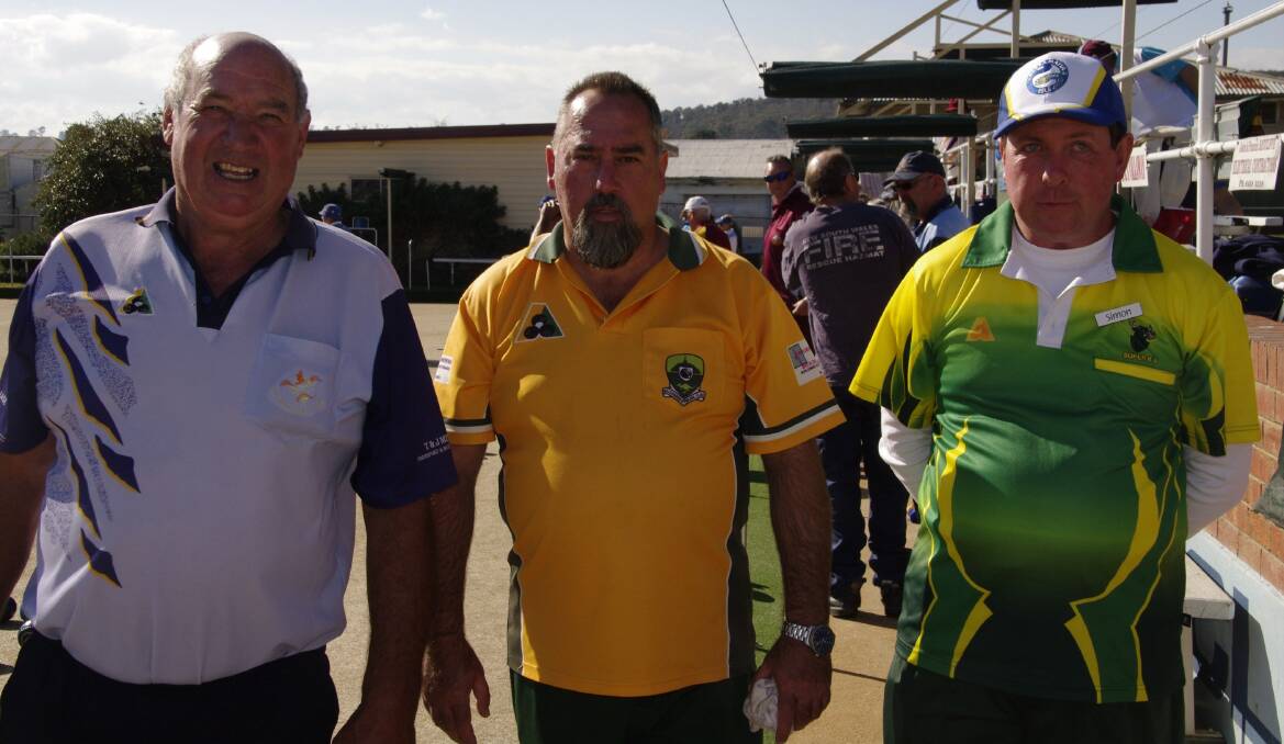 BOWLS: Bombala bowler Russell Yelds with Bruce Hance from Belconnen Bowling Club and Simon Thompson at the May Carnival in Bombala over the weekend.