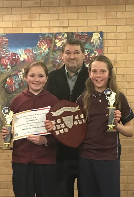 OUTSTANDING: Bombala students Jemima Merritt and Makyla Price at the Principals' Pubic Speaking night with the president of Rotary Bombala, Michael Dyer.
