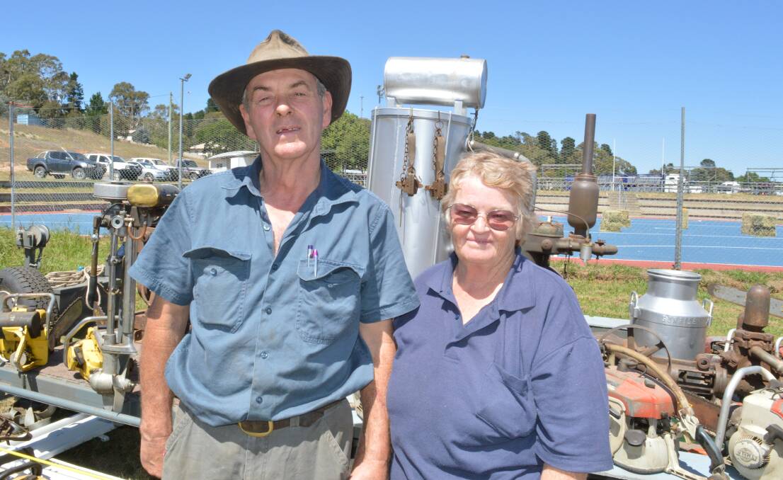 Bombala's Glen and Linda Bray with their array of chainsaws on display with the Bombala Historic Machinery Society.
