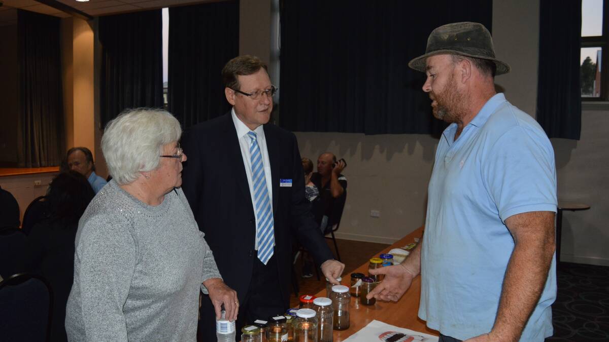 THE BEGINNING: Alison Gimbert, mayor Rooney and a concerned citizen at the first public meeting about Bombala's water supply.