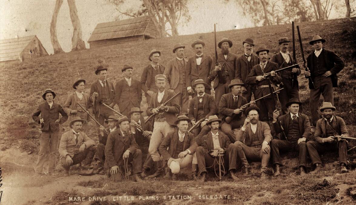 GOLDEN OLDIE: Twenty four shooters prepare to go out on a Hare Drive at Little Plains Station, Delegate sometime in the last century. Does anyone have any information about the people pictured. 