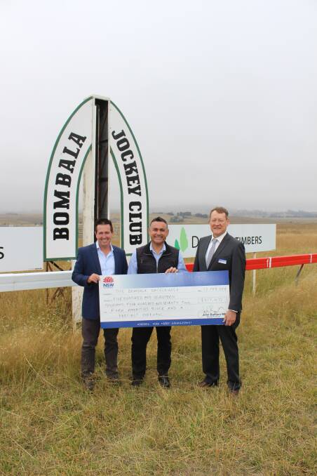 John Barilaro and the Minister for Racing Paul Toole presented Snowy Monaro Regional Council mayor John Rooney with $517,472 for the Bombala Racecourse.