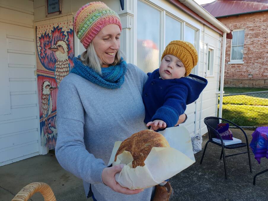 Esther and her son Elliott Ingram with Esther's home made sourdough bread at the Delegate market on Saturday.