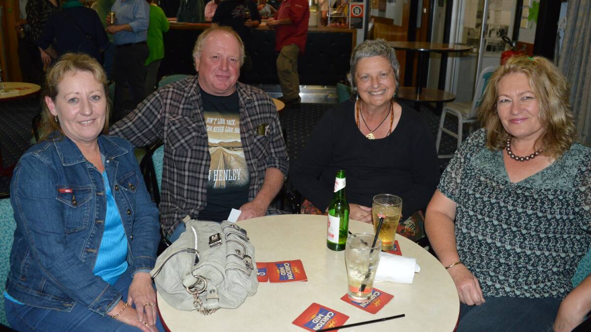 Ann and Glenn Stokes with Deb Tresham and Annette Twomey of Delegate dining out at the Delegate Country Club on St. Patrick's Day.