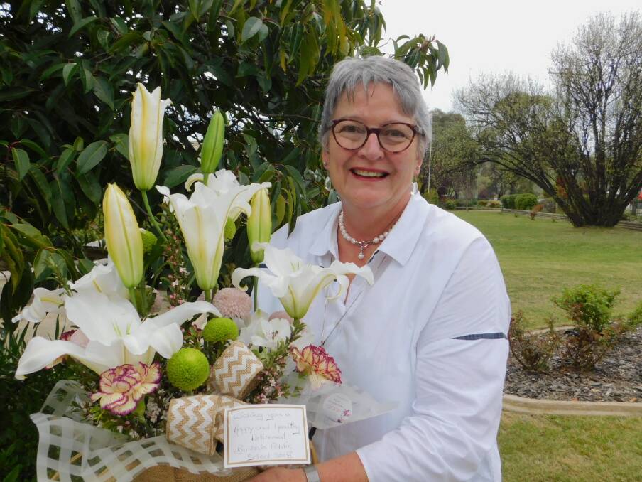 FAREWELL: Long-time teacher Mrs Fiona Crawford was farewelled and congratulated on her retirement from teaching by staff and students at Bombala Public School.