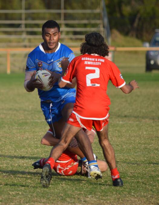 POWERFUL PLAYER: Bombala Blue Heeler first grade player Wame Belolevu with the ball in Sunday's game against the Narooma Devils at Bill Smyth Oval Narooma.