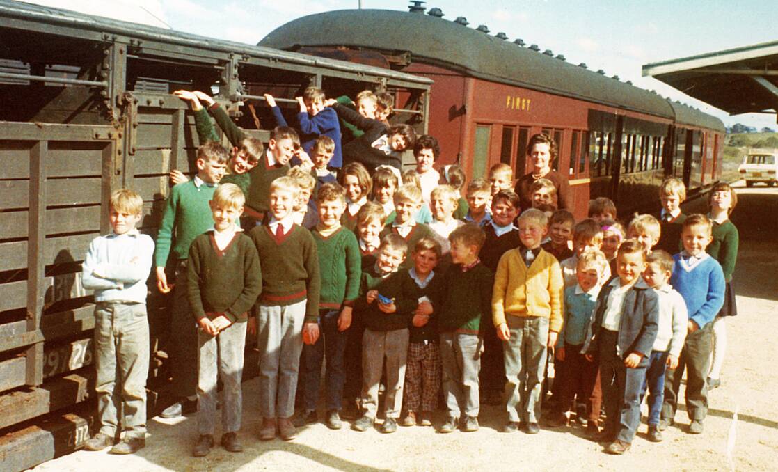 GOLDEN OLDIE: Cathcart Public School visited Bombala Railway Station sometime in the '60's or '70s.  Do you recognise anyone in this photo or know what they were doing?