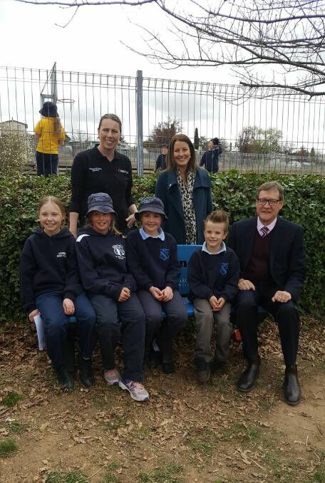 On Monday, mayor John Rooney joined council’s Waste Education officer Edwina Lowe to present the buddy bench to Alex and St Joseph's Primary School.