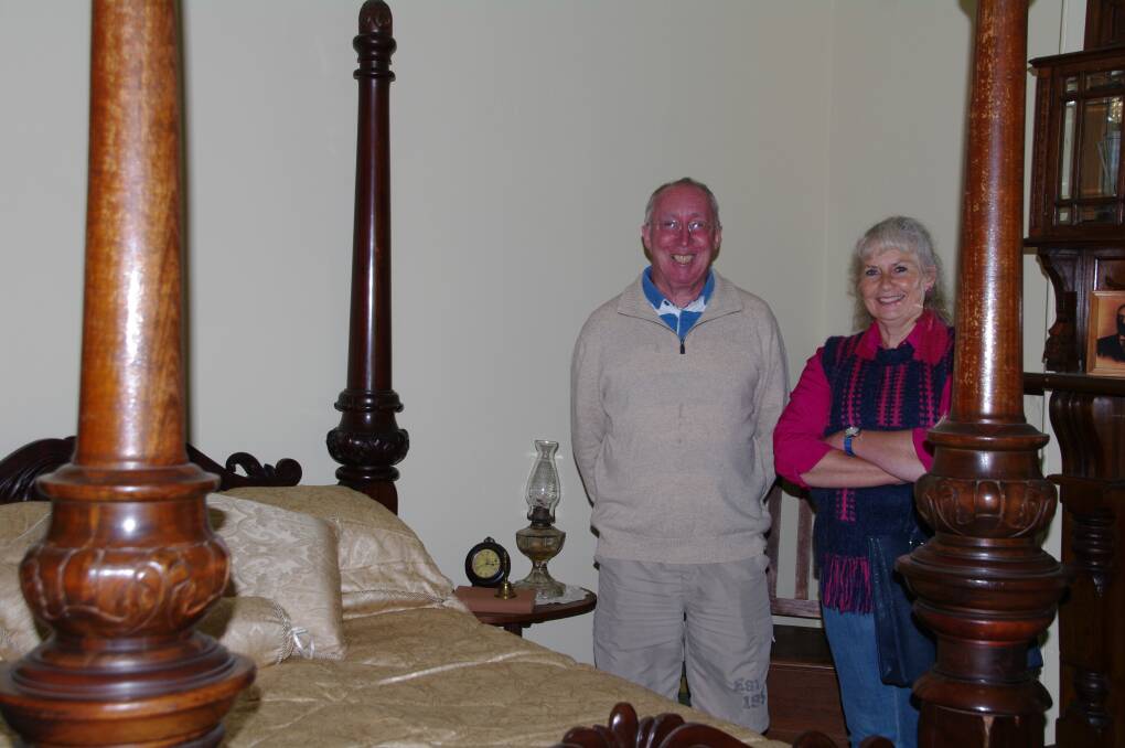 Denis McGhie and Gazelle Wicks check out HT Edwards bedroom on a recent tour of Burnima Homestead.