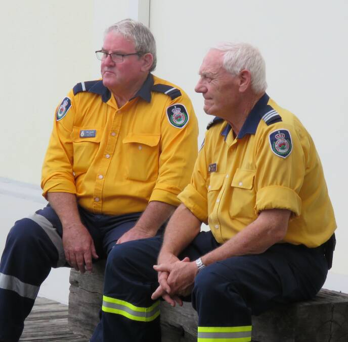 Eden Rural Fire Brigade's Rob Aucote and Peter Standen were among the small gathering at the official opening of Looking Up and Around. Photo: supplied