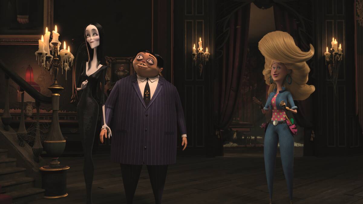 From left, Morticia Addams (voiced by Charlize Theron), Oscar Isaac ( Gomez Addams) and Allison Janney (Margaux Needler) in The Addams Family. Picture: Metro-Goldwyn-Mayer Pictures Inc. 