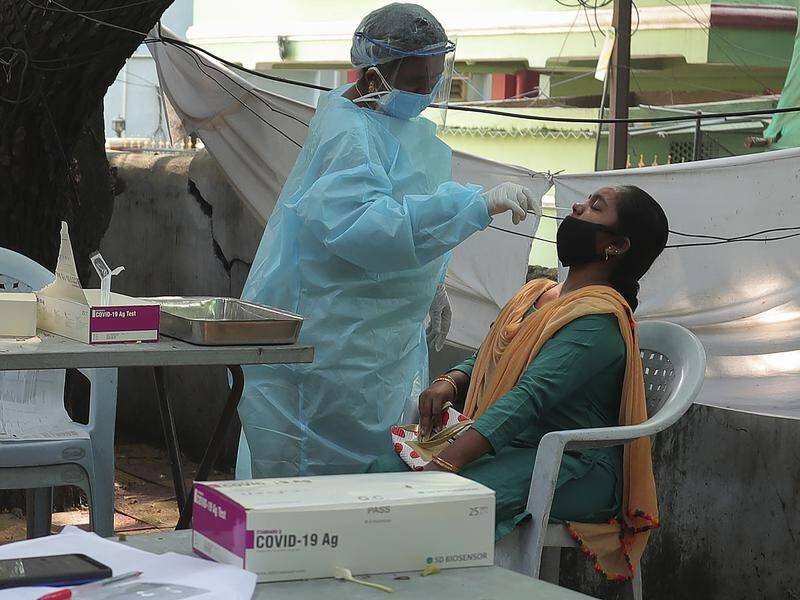 India has surpassed 8 million coronavirus cases, only the second country to do so after the US.