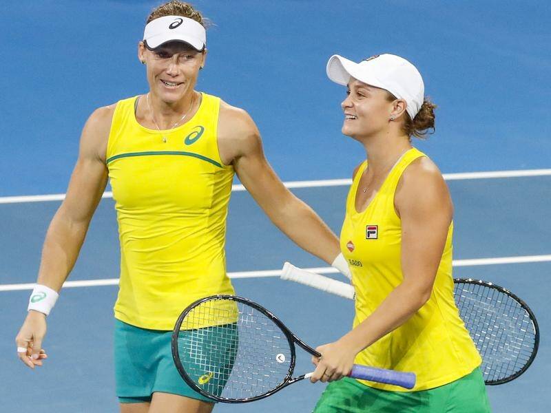Sam Stosur (L) has cried after she and Ashleigh Barty put Australia into the Fed Cup final.