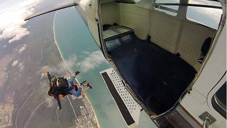 A skydiver jumps out of a Skydive Bribie plane. Photo: Skydive Bribie Facebook page