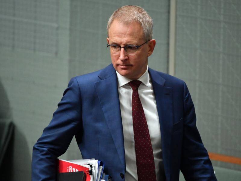 Paul Fletcher is demanding the ABC justify the Four Corners scrutiny of two government MPs.
