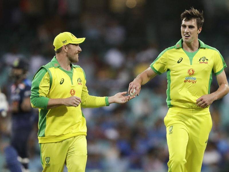 Aaron Finch (l) warns that run penalties for slow over rates could be hard to assess fairly.